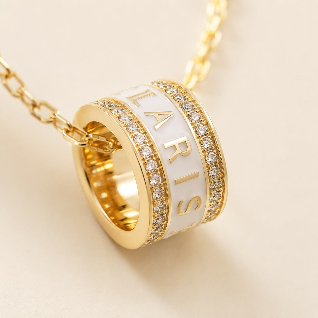 PARISTORY Gold-Tone Ring Pendant Necklace with White Enamel and Sparkling Accents