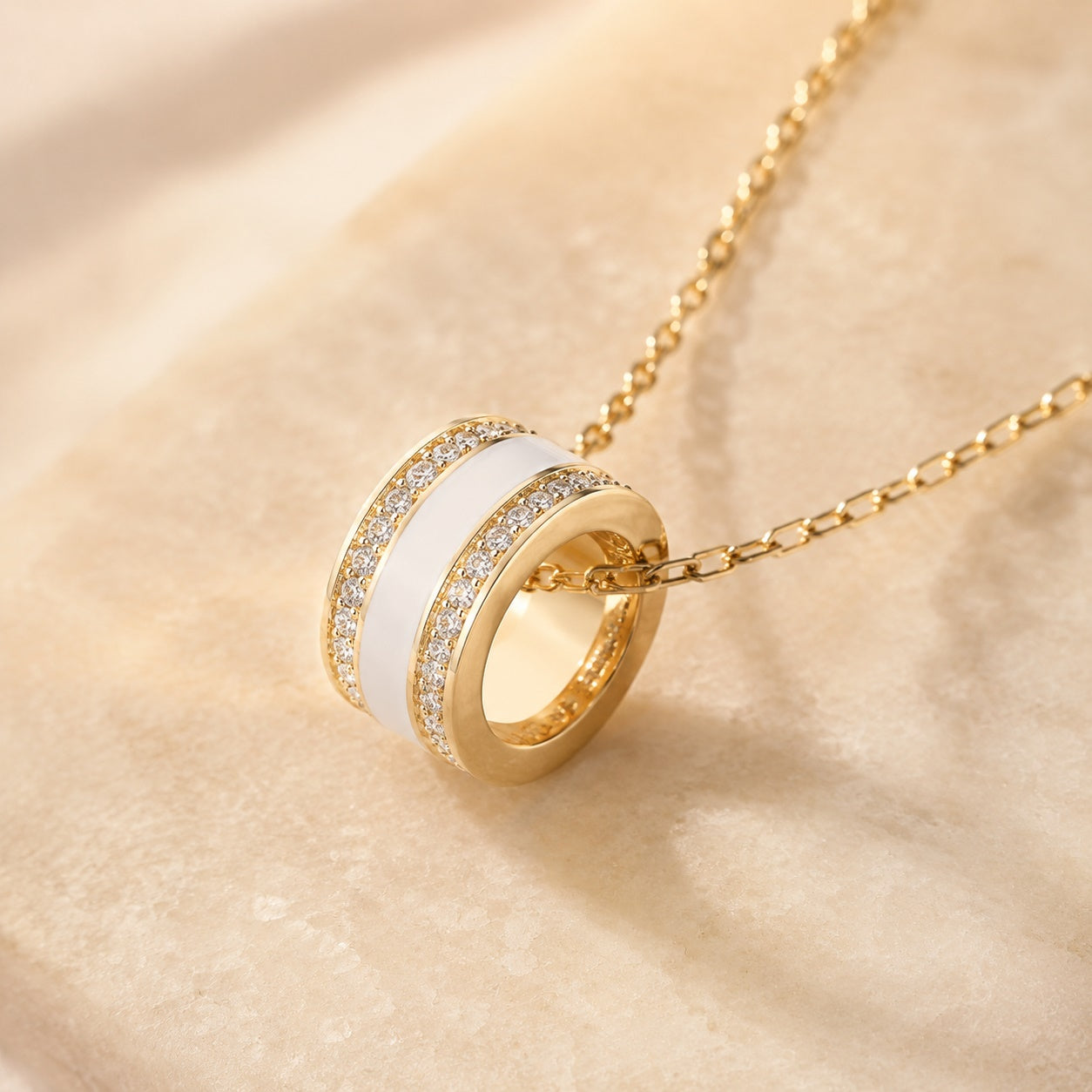 PARISTORY Gold-Tone Ring Pendant Necklace with White Enamel and Sparkling Accents