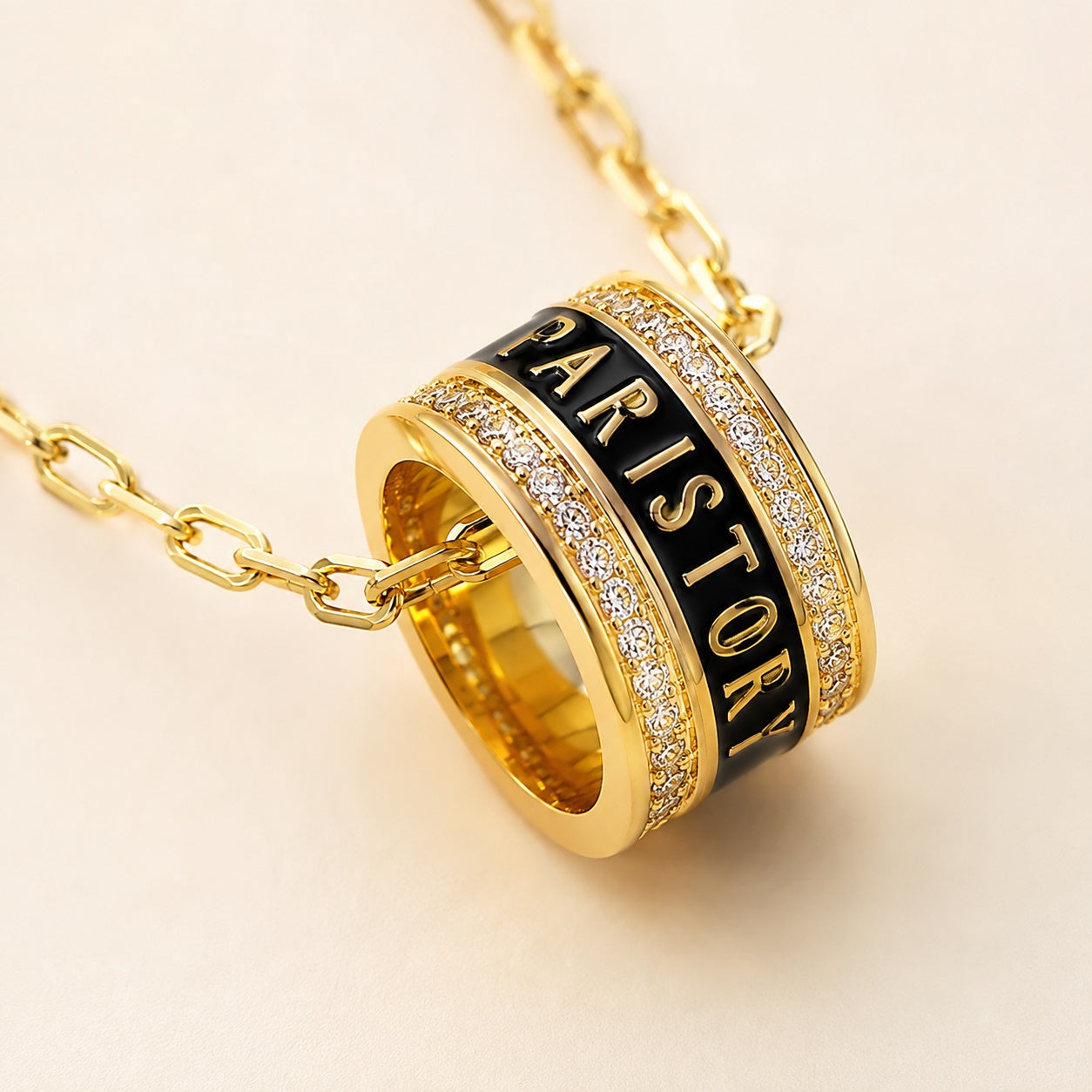 PARISTORY Gold-Tone Ring Pendant Necklace with Black Enamel and Sparkling Accents