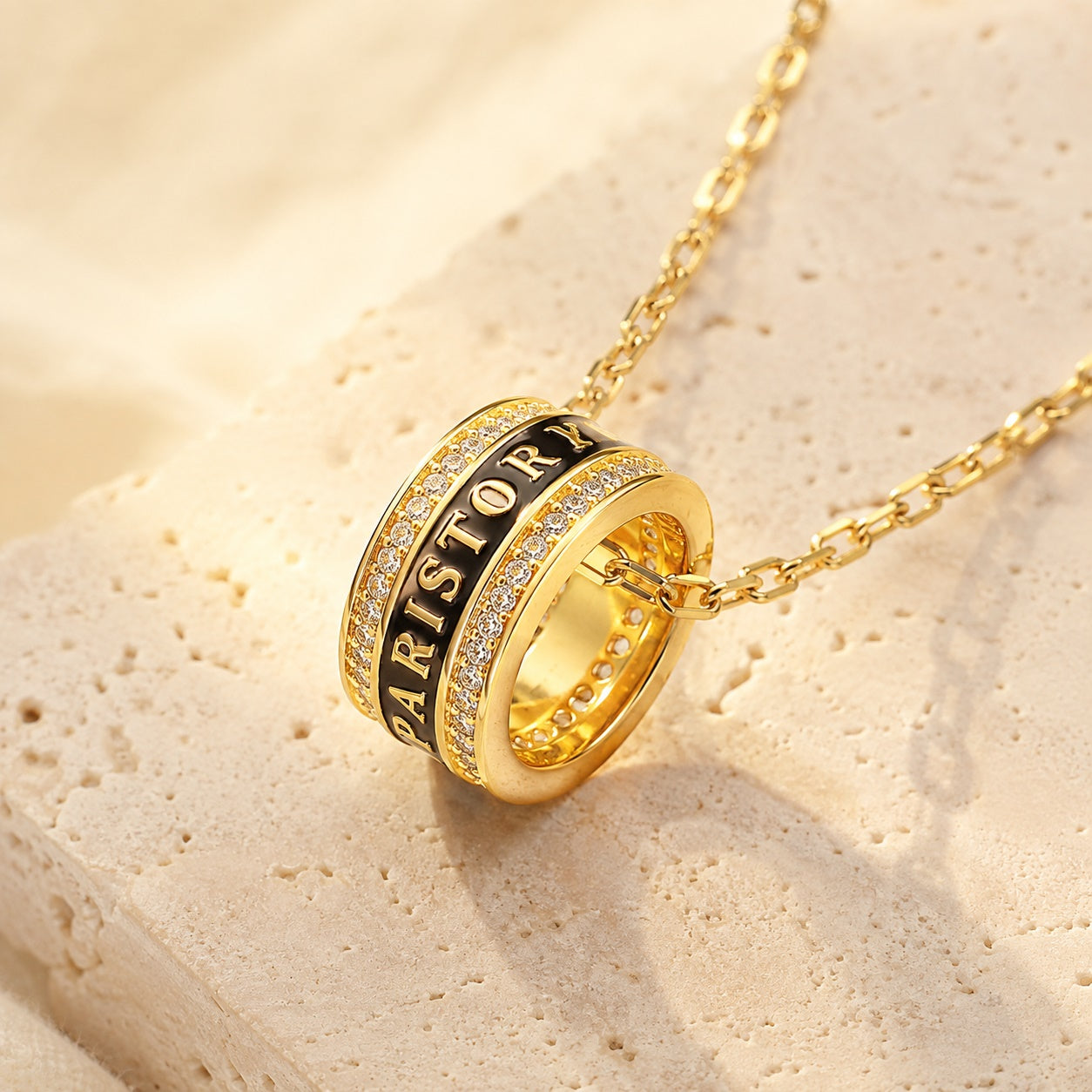 PARISTORY Gold-Tone Ring Pendant Necklace with Black Enamel and Sparkling Accents