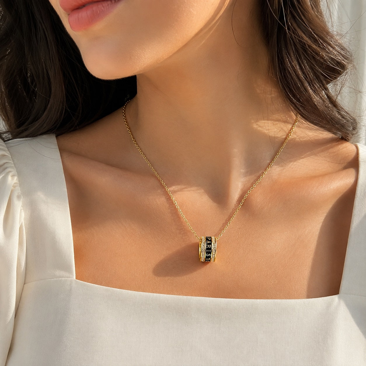 PARISTORY Gold-Tone Ring Pendant Necklace with Black Enamel and Sparkling Accents