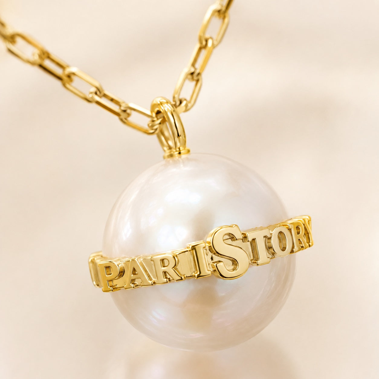 PARISTORY Gold-Tone Pearl Pendant Necklace with Signature Letter Band